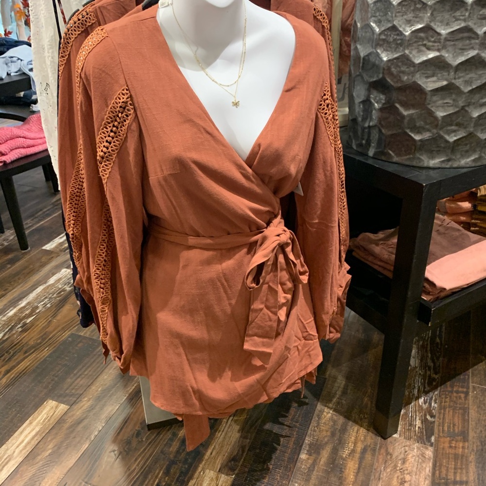 Chic Mauve Wrap Blouse with Lace Accents